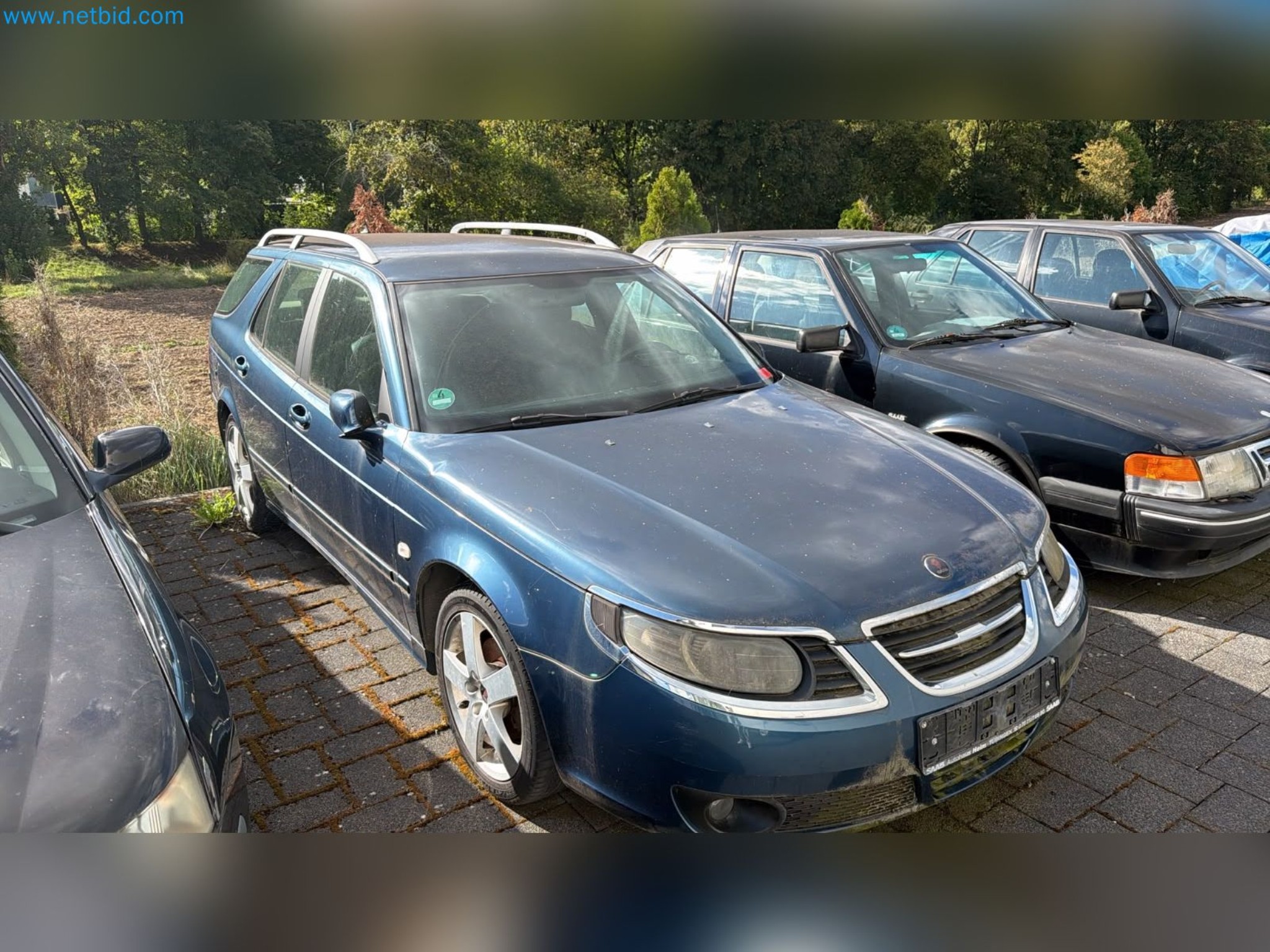 Passenger cars, electric cars, and automotive repair shop equipment at a Fiat dealership-2