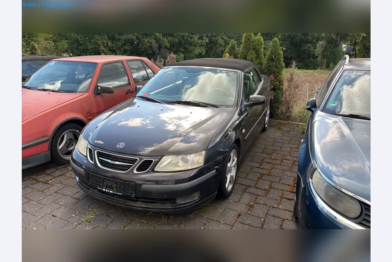 Passenger cars, electric cars, and automotive repair shop equipment at a Fiat dealership-2