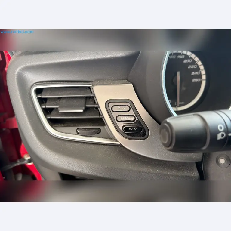 Passenger cars, electric cars, and automotive repair shop equipment at a Fiat dealership-4