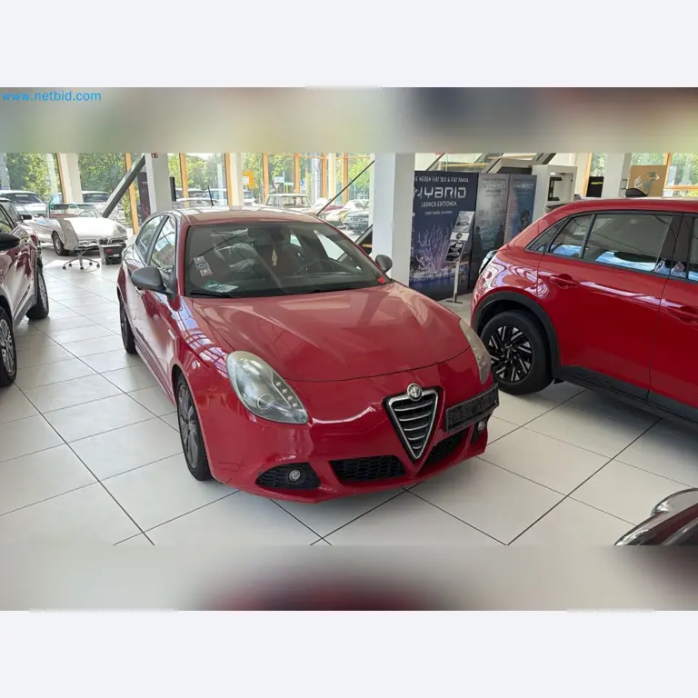 Passenger cars, electric cars, and automotive repair shop equipment at a Fiat dealership-6