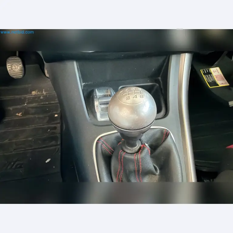 Passenger cars, electric cars, and automotive repair shop equipment at a Fiat dealership-8