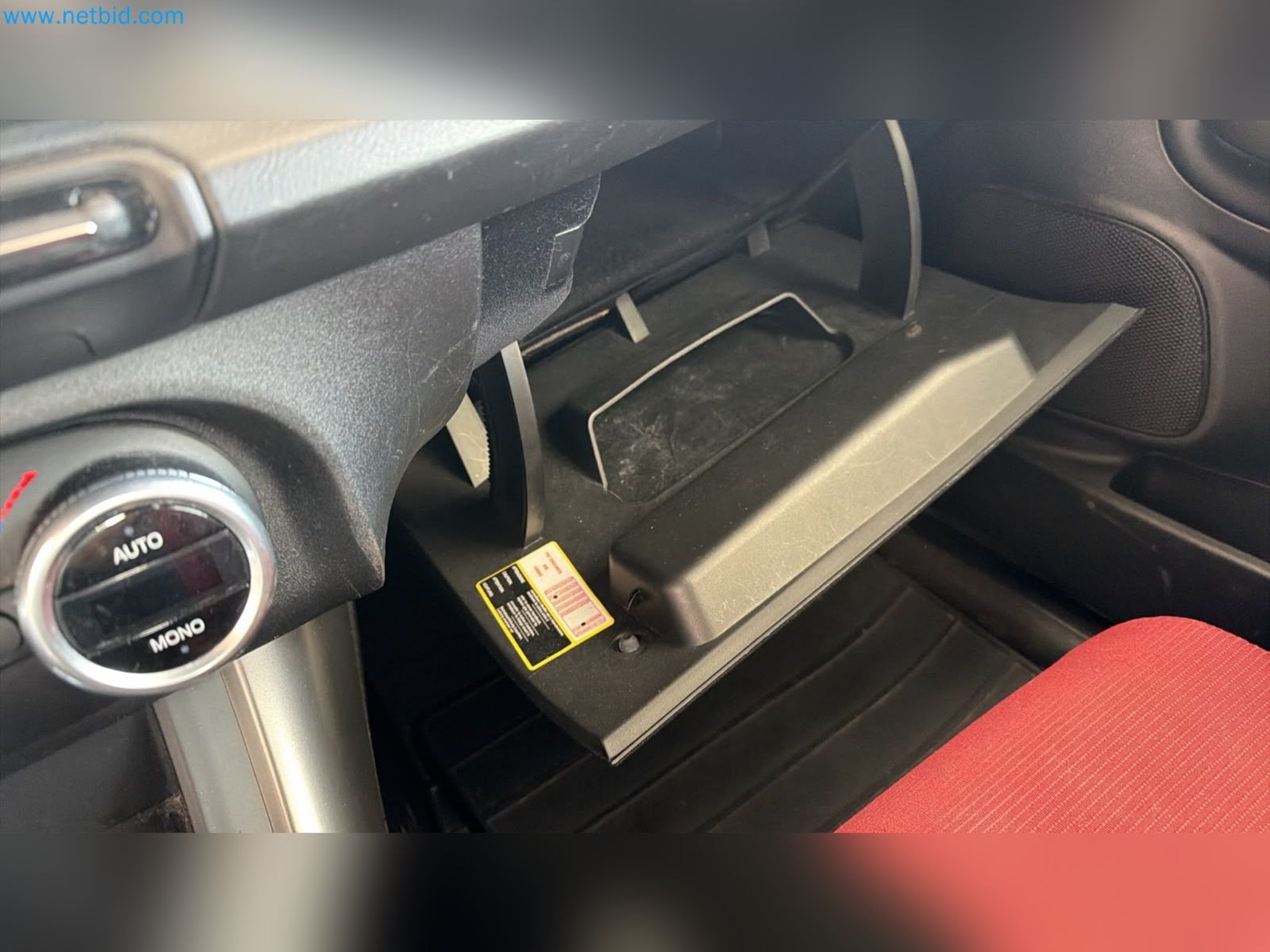 Passenger cars, electric cars, and automotive repair shop equipment at a Fiat dealership-9
