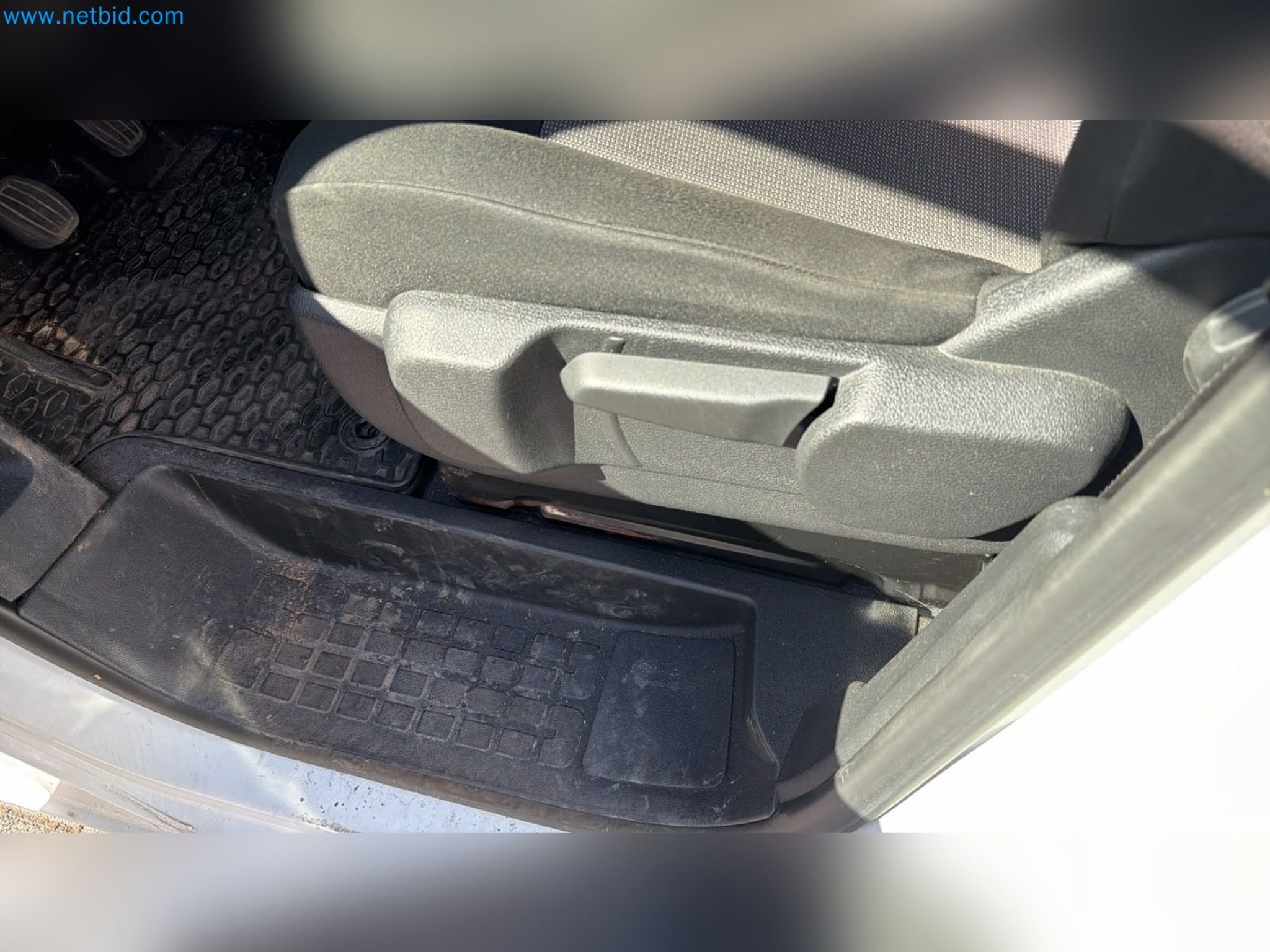 Passenger cars, electric cars, and automotive repair shop equipment at a Fiat dealership-10