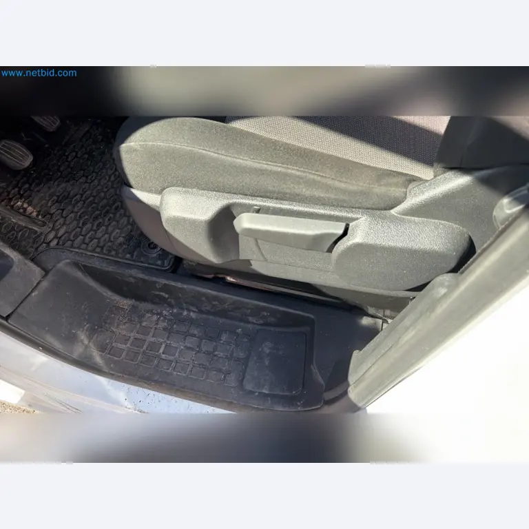 Passenger cars, electric cars, and automotive repair shop equipment at a Fiat dealership-10