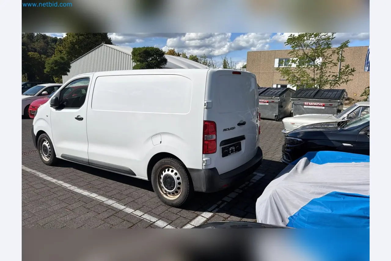 Passenger cars, electric cars, and automotive repair shop equipment at a Fiat dealership-8