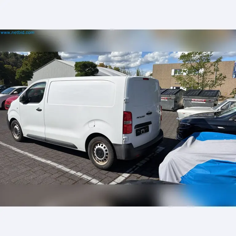 Passenger cars, electric cars, and automotive repair shop equipment at a Fiat dealership-8