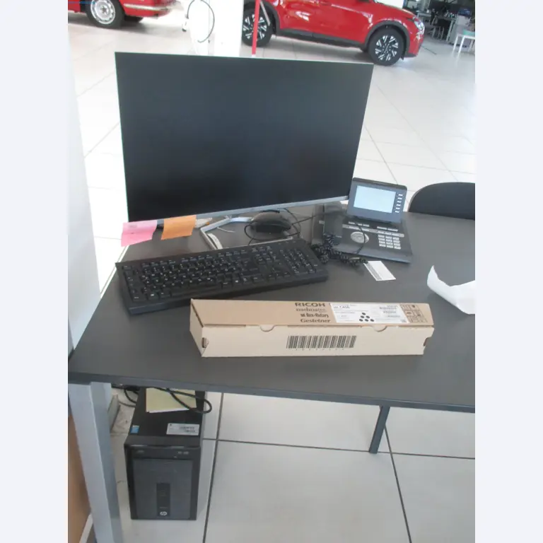 Passenger cars, electric cars, and automotive repair shop equipment at a Fiat dealership-1