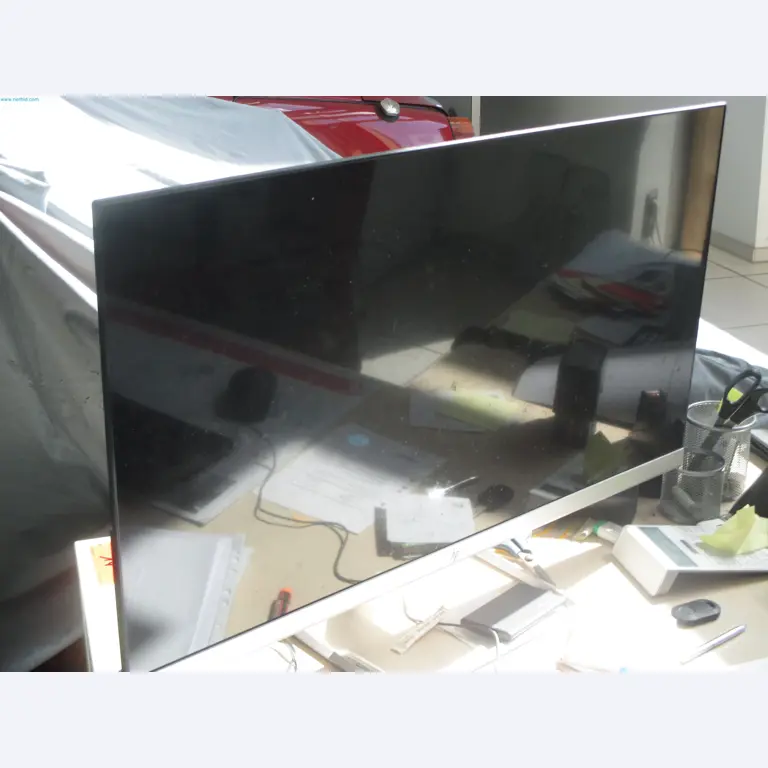 Passenger cars, electric cars, and automotive repair shop equipment at a Fiat dealership-2