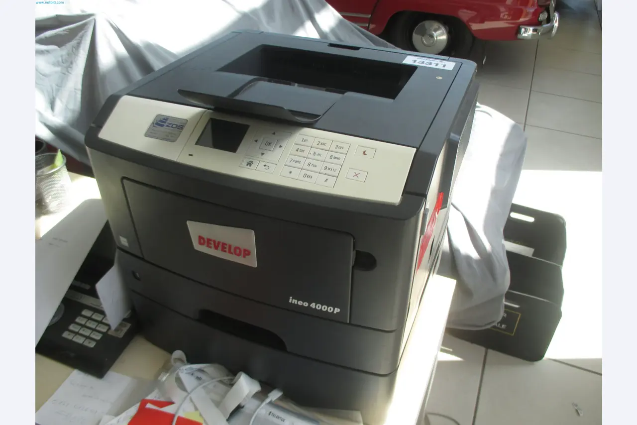Passenger cars, electric cars, and automotive repair shop equipment at a Fiat dealership-1
