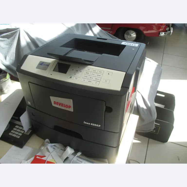 Passenger cars, electric cars, and automotive repair shop equipment at a Fiat dealership-1