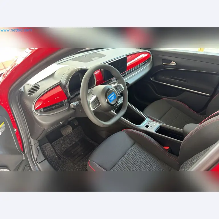 Passenger cars, electric cars, and automotive repair shop equipment at a Fiat dealership-12