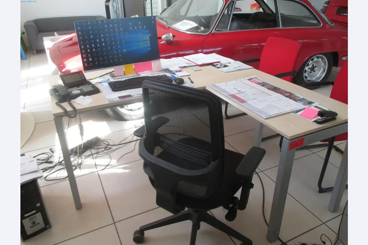 Passenger cars, electric cars, and automotive repair shop equipment at a Fiat dealership-1