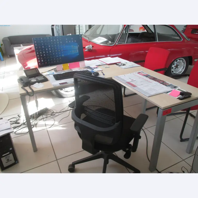 Passenger cars, electric cars, and automotive repair shop equipment at a Fiat dealership-1
