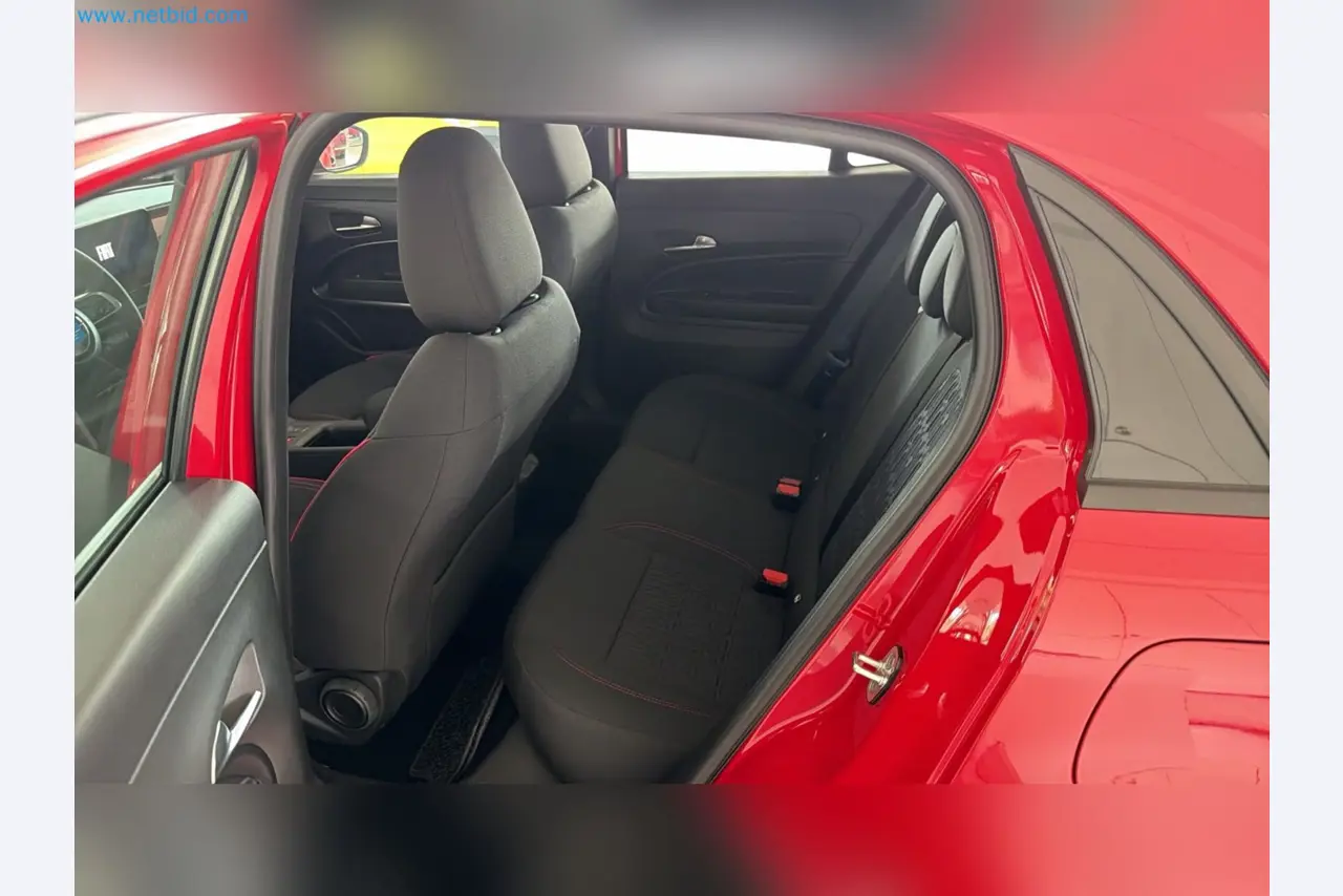 Passenger cars, electric cars, and automotive repair shop equipment at a Fiat dealership-10
