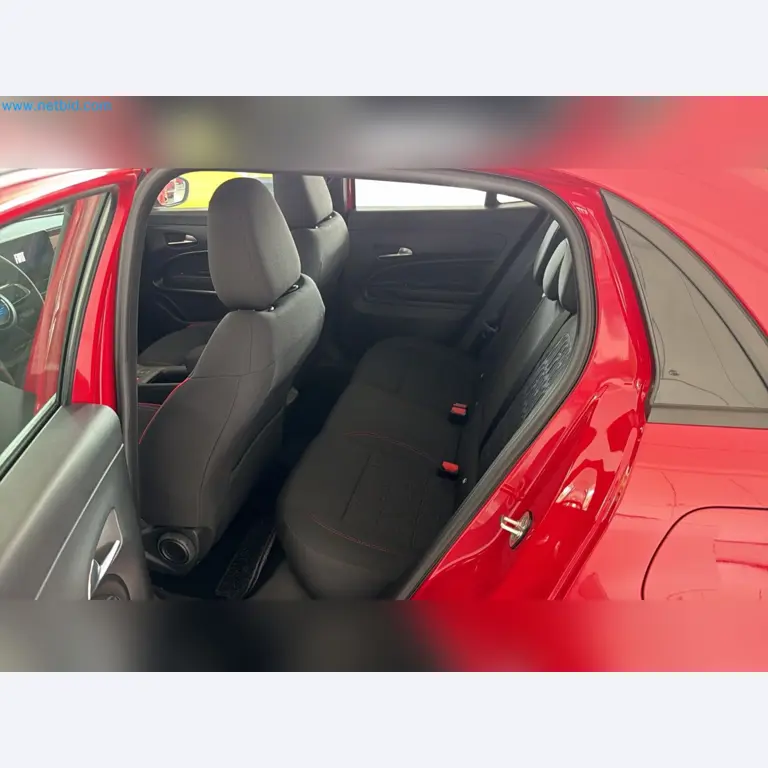 Passenger cars, electric cars, and automotive repair shop equipment at a Fiat dealership-10