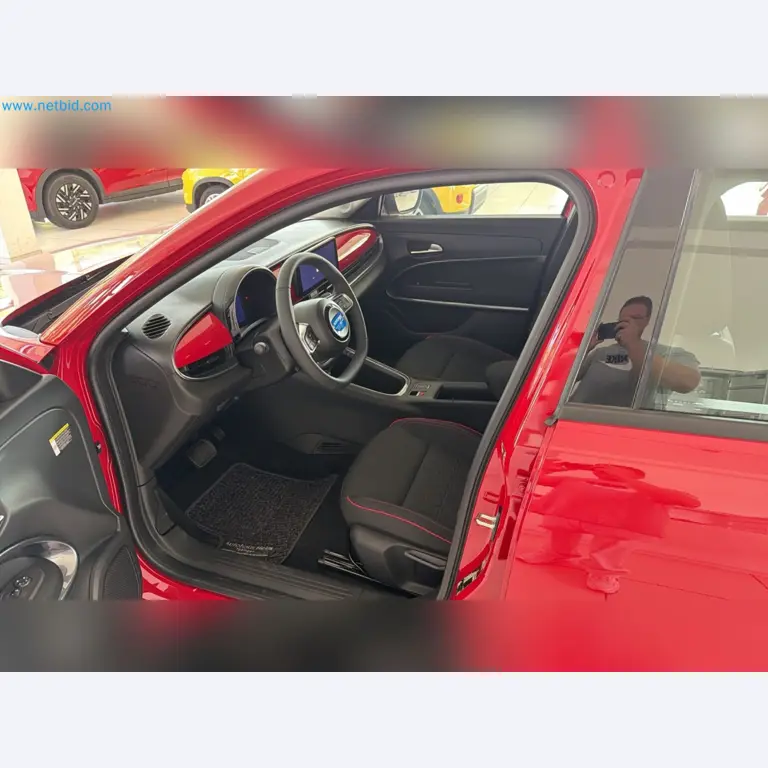 Passenger cars, electric cars, and automotive repair shop equipment at a Fiat dealership-13