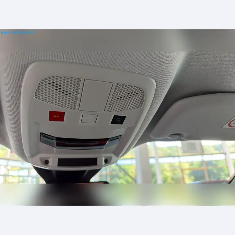 Passenger cars, electric cars, and automotive repair shop equipment at a Fiat dealership-14