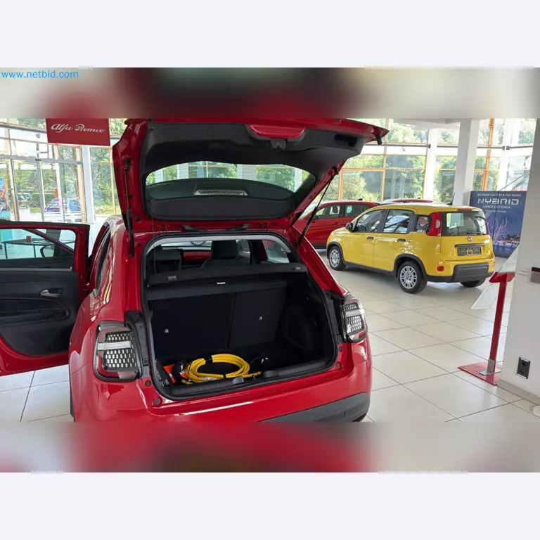 Passenger cars, electric cars, and automotive repair shop equipment at a Fiat dealership-3