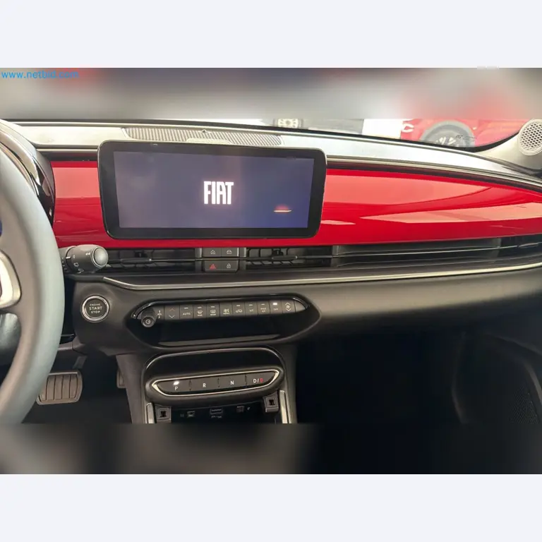 Passenger cars, electric cars, and automotive repair shop equipment at a Fiat dealership-7