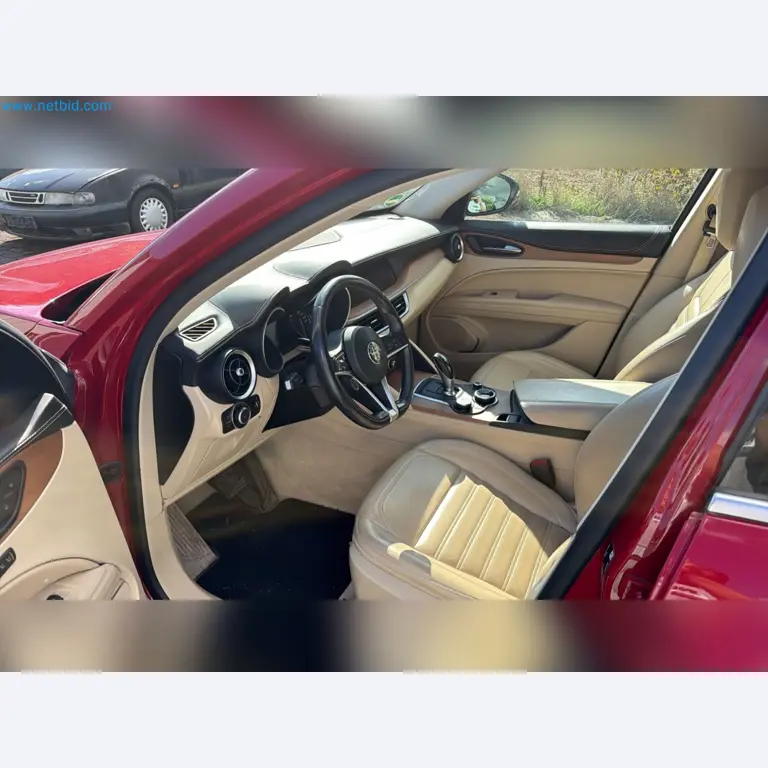 Passenger cars, electric cars, and automotive repair shop equipment at a Fiat dealership-10