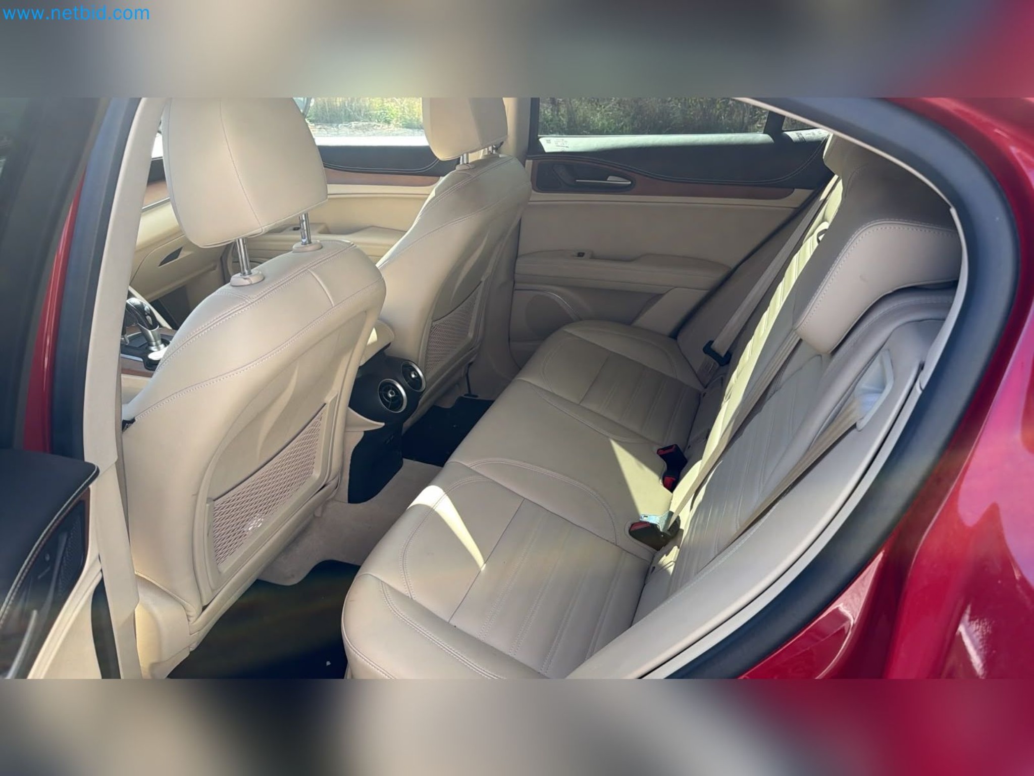 Passenger cars, electric cars, and automotive repair shop equipment at a Fiat dealership-11
