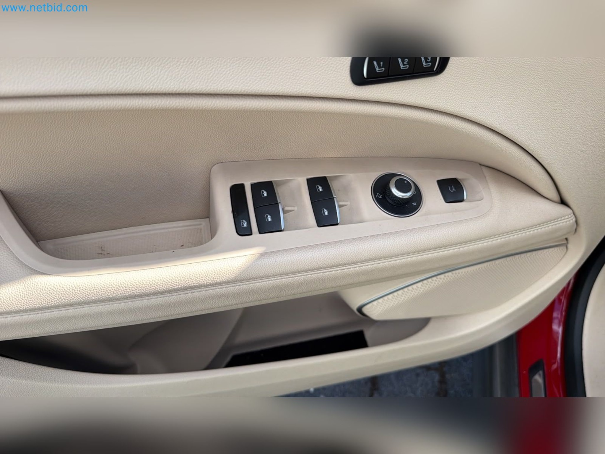 Passenger cars, electric cars, and automotive repair shop equipment at a Fiat dealership-13