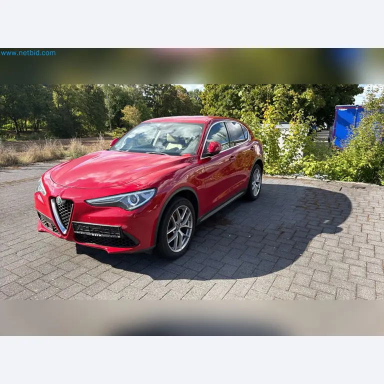 Passenger cars, electric cars, and automotive repair shop equipment at a Fiat dealership-2