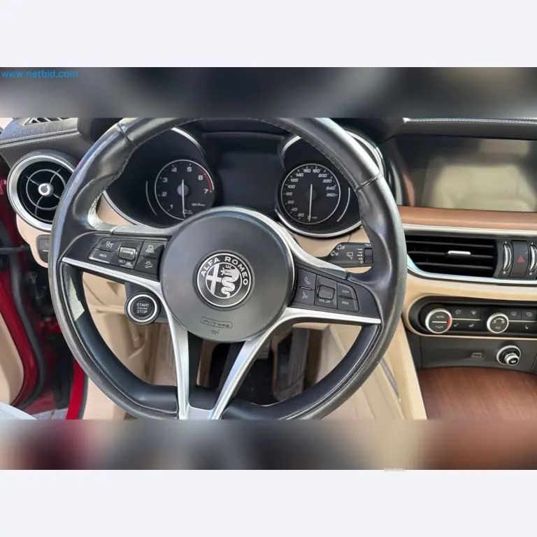 Passenger cars, electric cars, and automotive repair shop equipment at a Fiat dealership-4