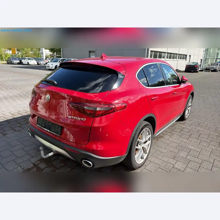Passenger cars, electric cars, and automotive repair shop equipment at a Fiat dealership-8