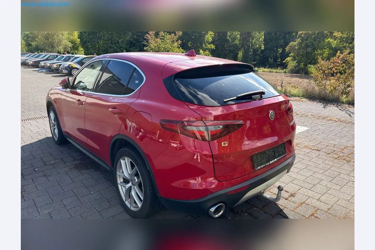 Passenger cars, electric cars, and automotive repair shop equipment at a Fiat dealership-9