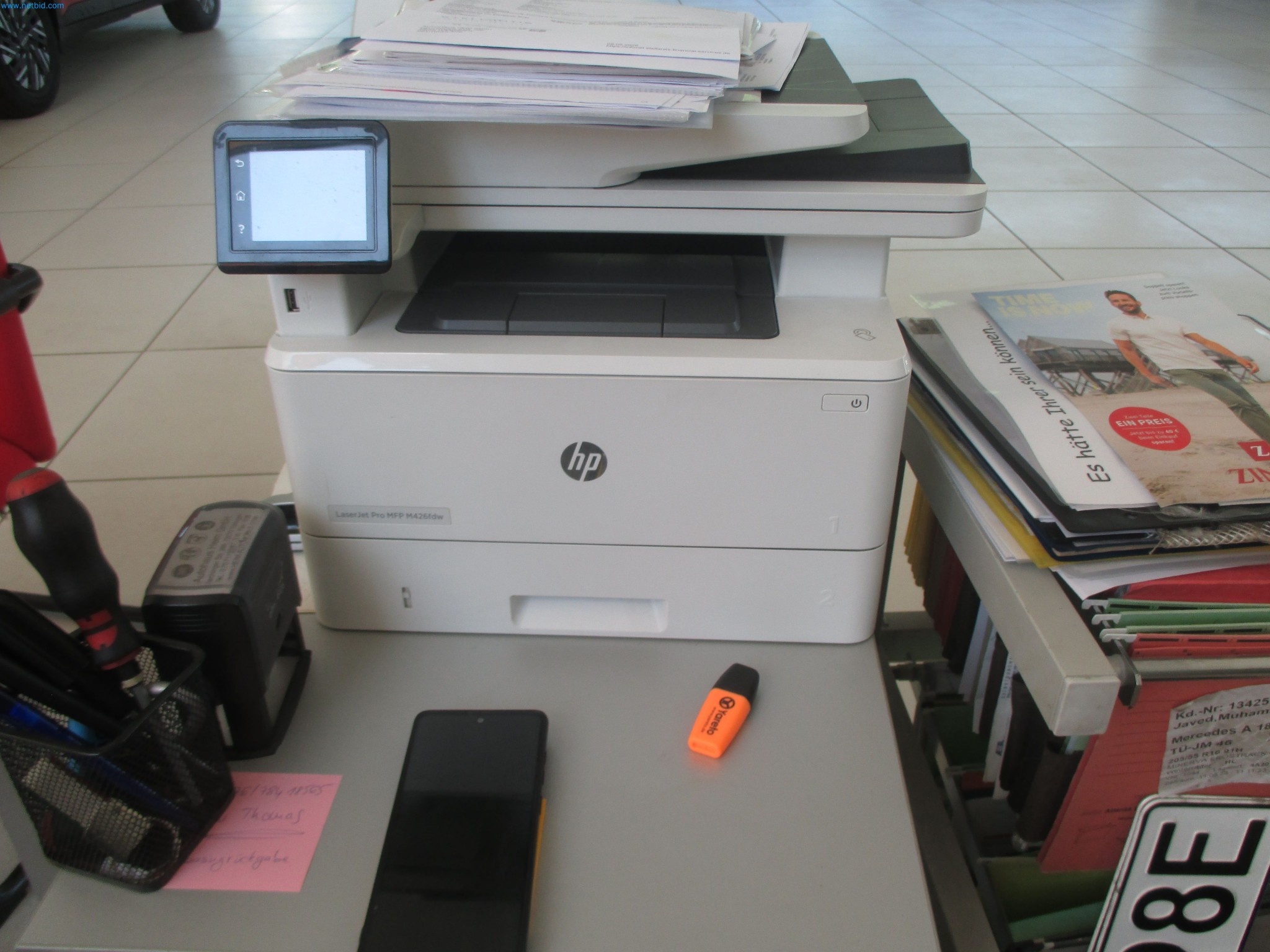 Passenger cars, electric cars, and automotive repair shop equipment at a Fiat dealership-3
