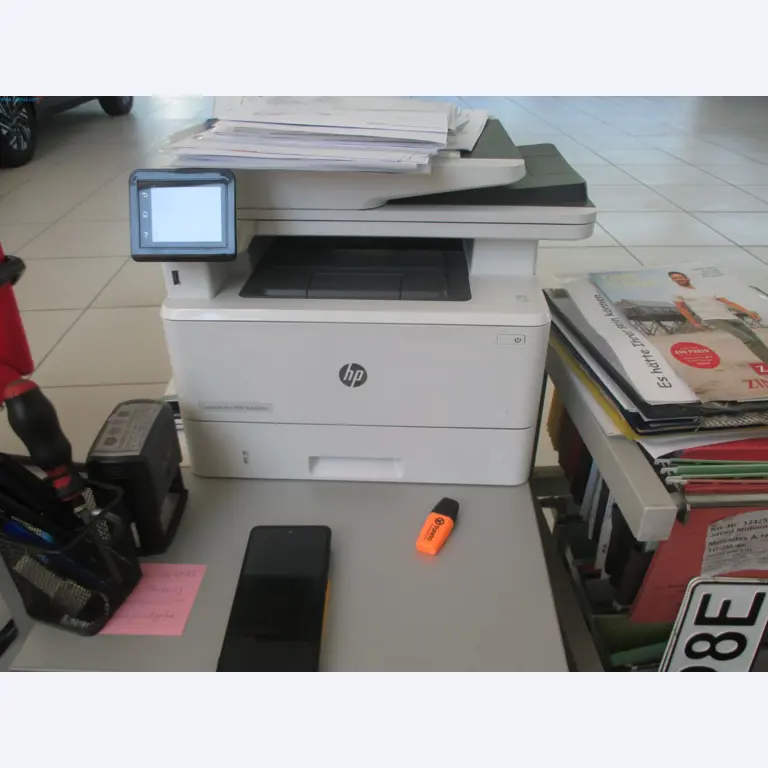 Passenger cars, electric cars, and automotive repair shop equipment at a Fiat dealership-3