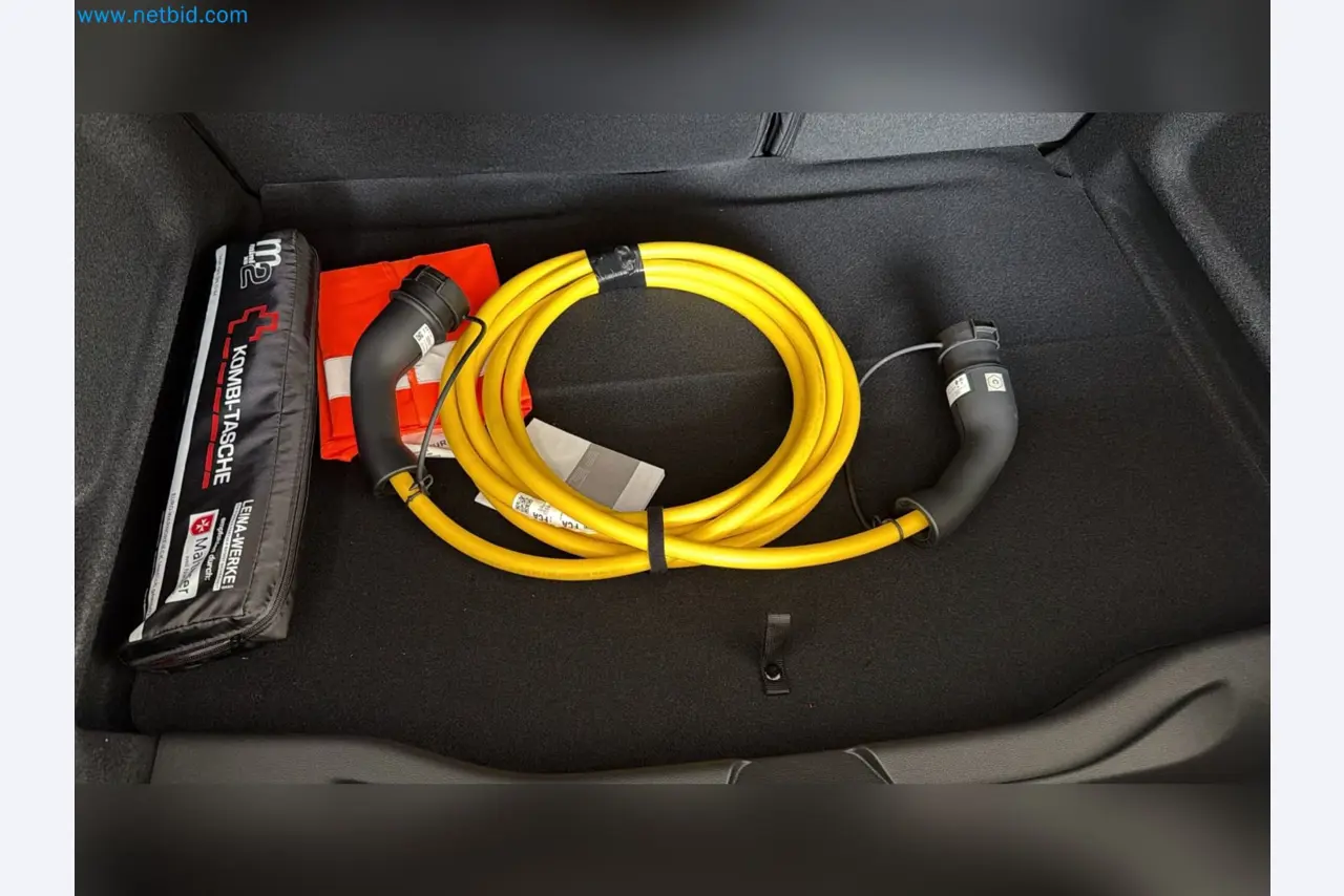 Passenger cars, electric cars, and automotive repair shop equipment at a Fiat dealership-4