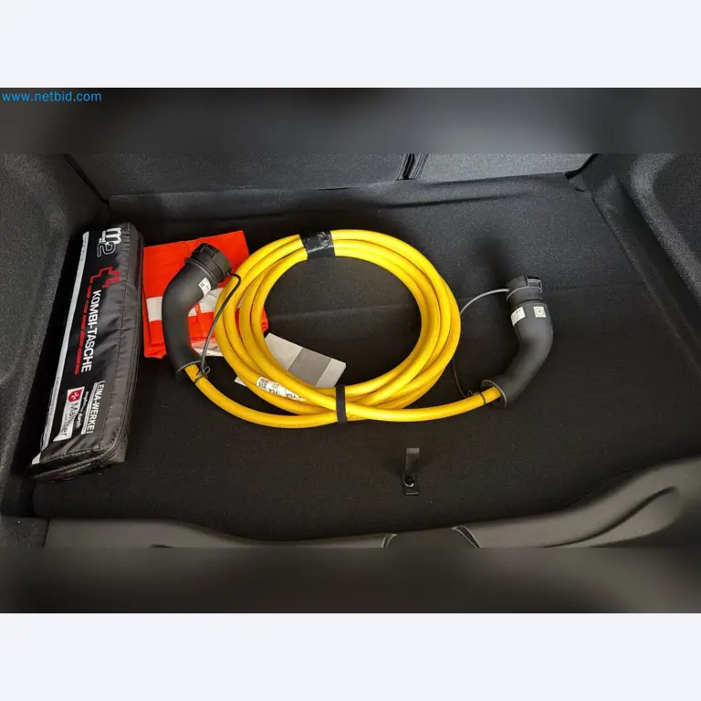 Passenger cars, electric cars, and automotive repair shop equipment at a Fiat dealership-4