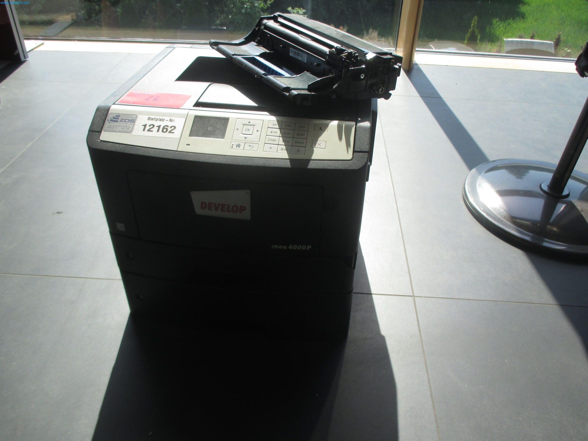 Passenger cars, electric cars, and automotive repair shop equipment at a Fiat dealership-7