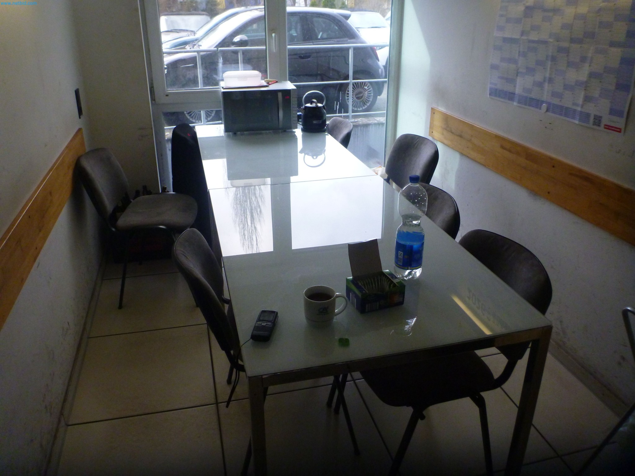 Passenger cars, electric cars, and automotive repair shop equipment at a Fiat dealership-5