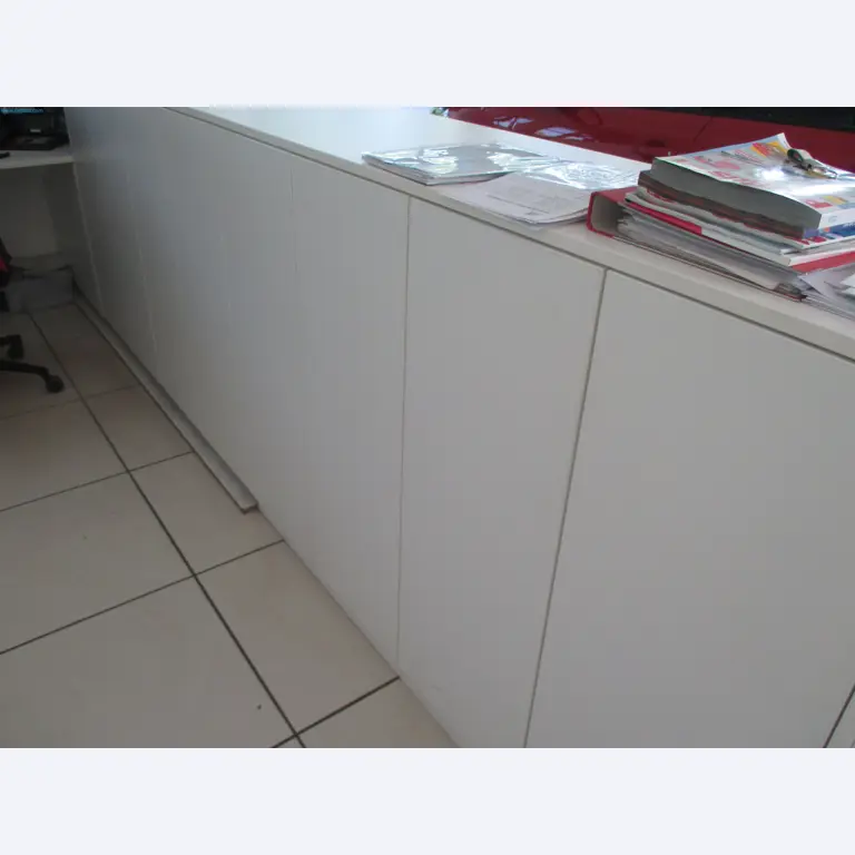 Passenger cars, electric cars, and automotive repair shop equipment at a Fiat dealership-3