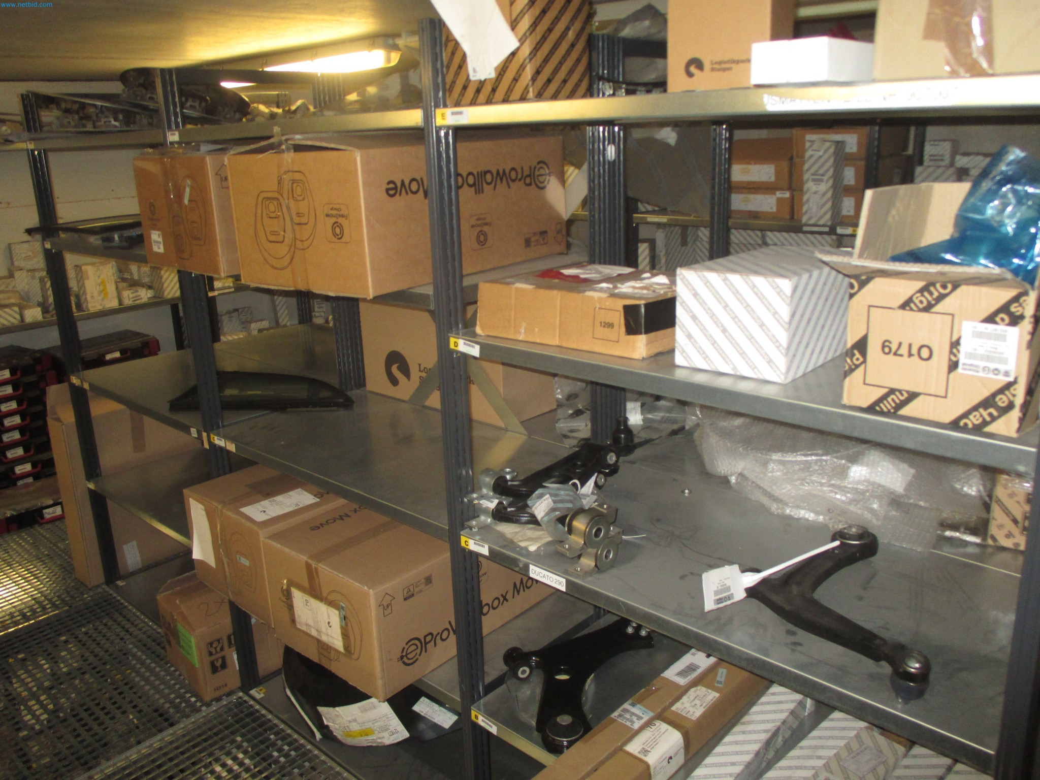Passenger cars, electric cars, and automotive repair shop equipment at a Fiat dealership-1