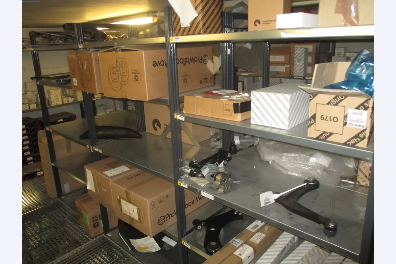 Passenger cars, electric cars, and automotive repair shop equipment at a Fiat dealership-1