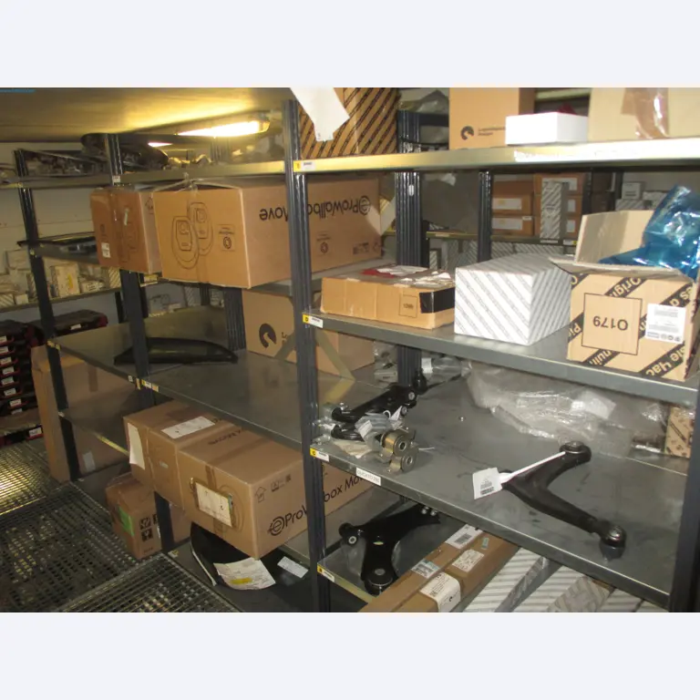 Passenger cars, electric cars, and automotive repair shop equipment at a Fiat dealership-1