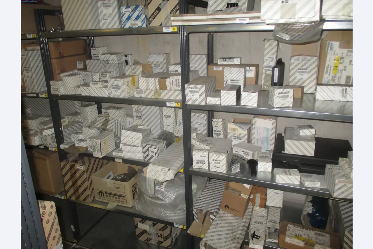 Passenger cars, electric cars, and automotive repair shop equipment at a Fiat dealership-2