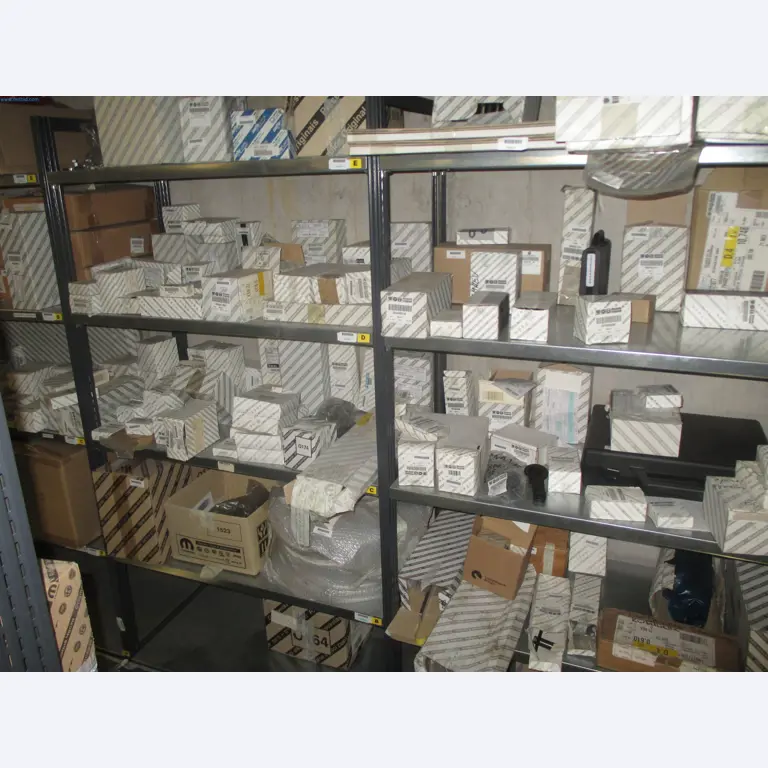 Passenger cars, electric cars, and automotive repair shop equipment at a Fiat dealership-2