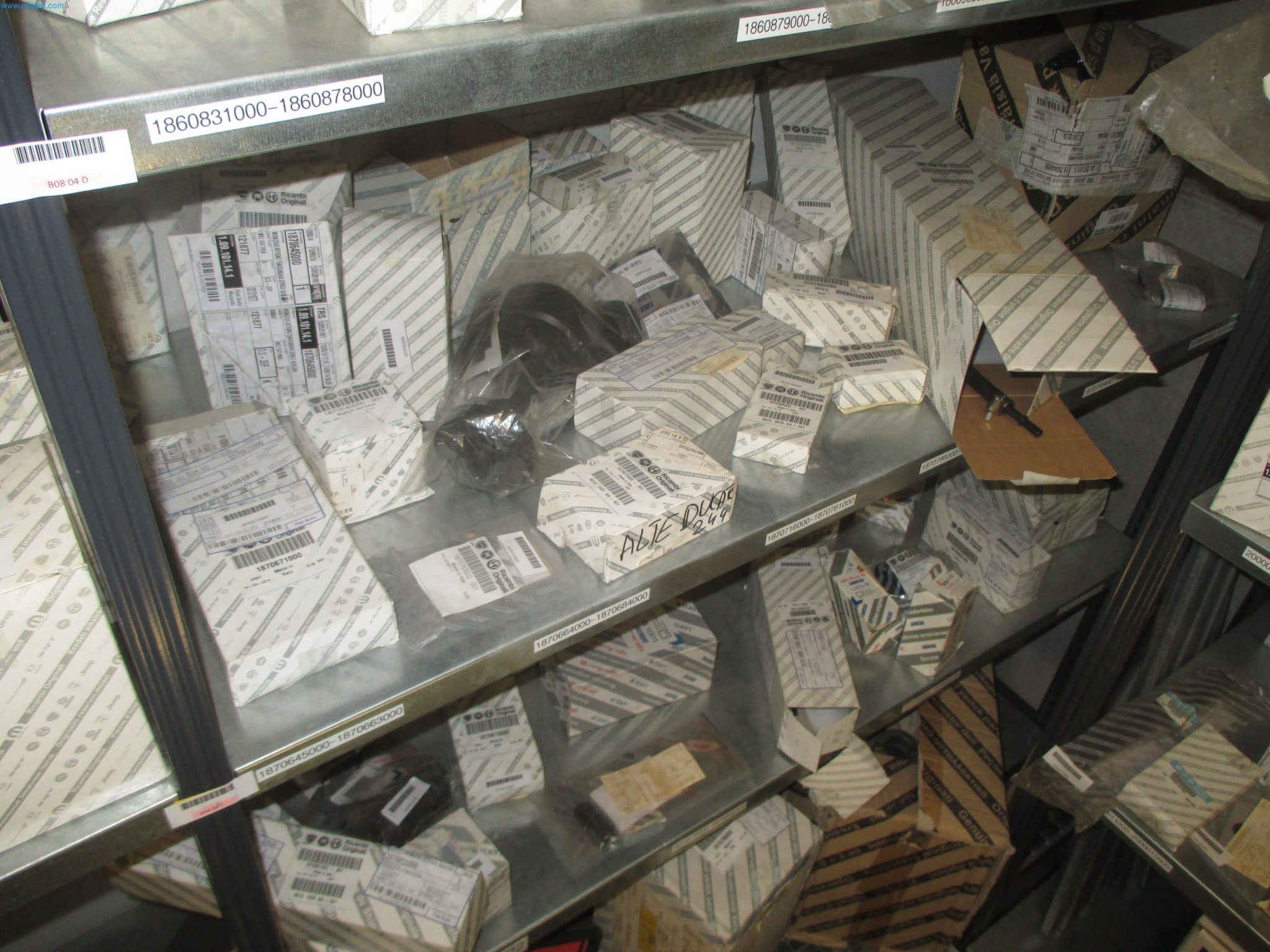 Passenger cars, electric cars, and automotive repair shop equipment at a Fiat dealership-3