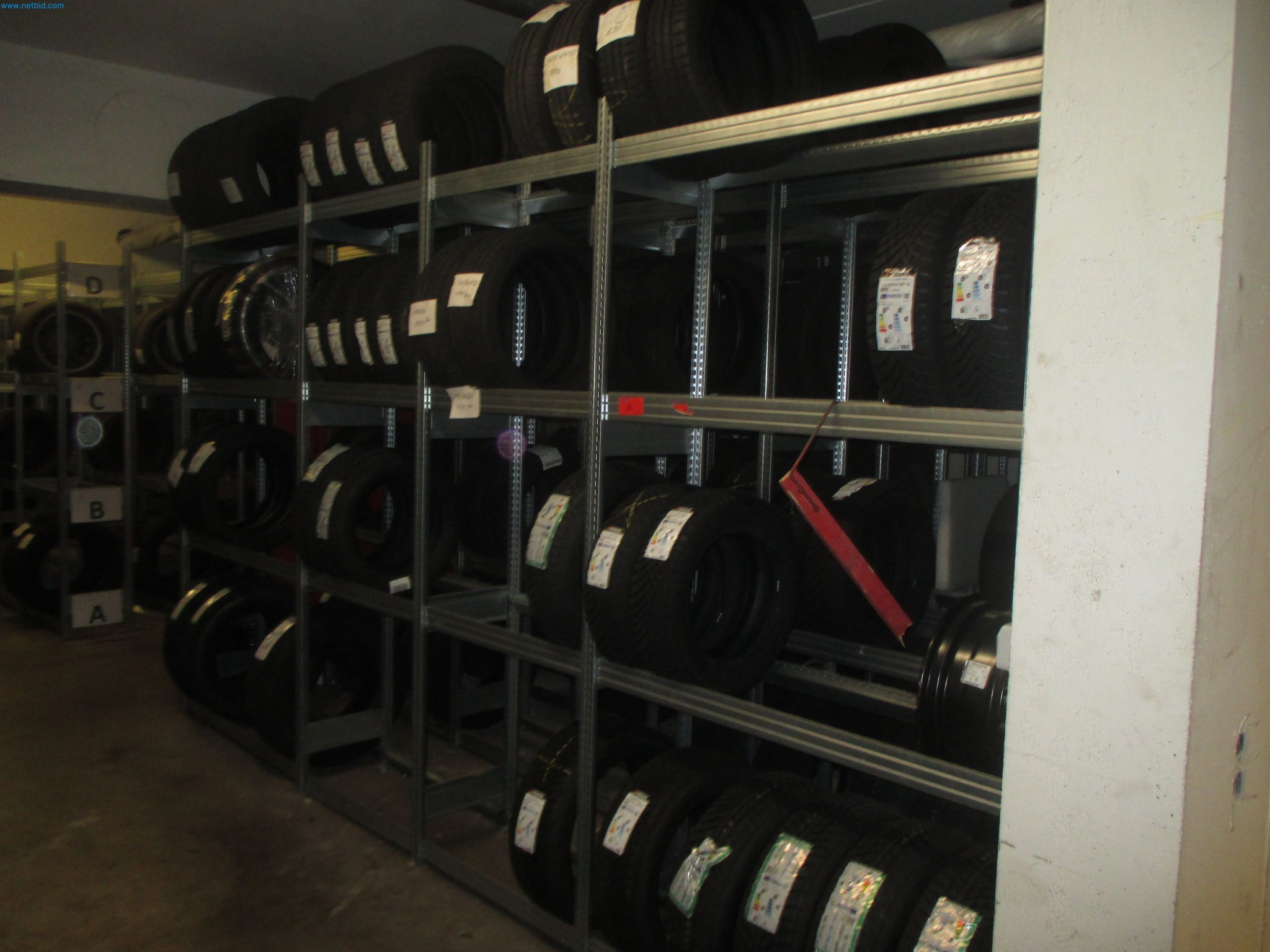 Passenger cars, electric cars, and automotive repair shop equipment at a Fiat dealership-1