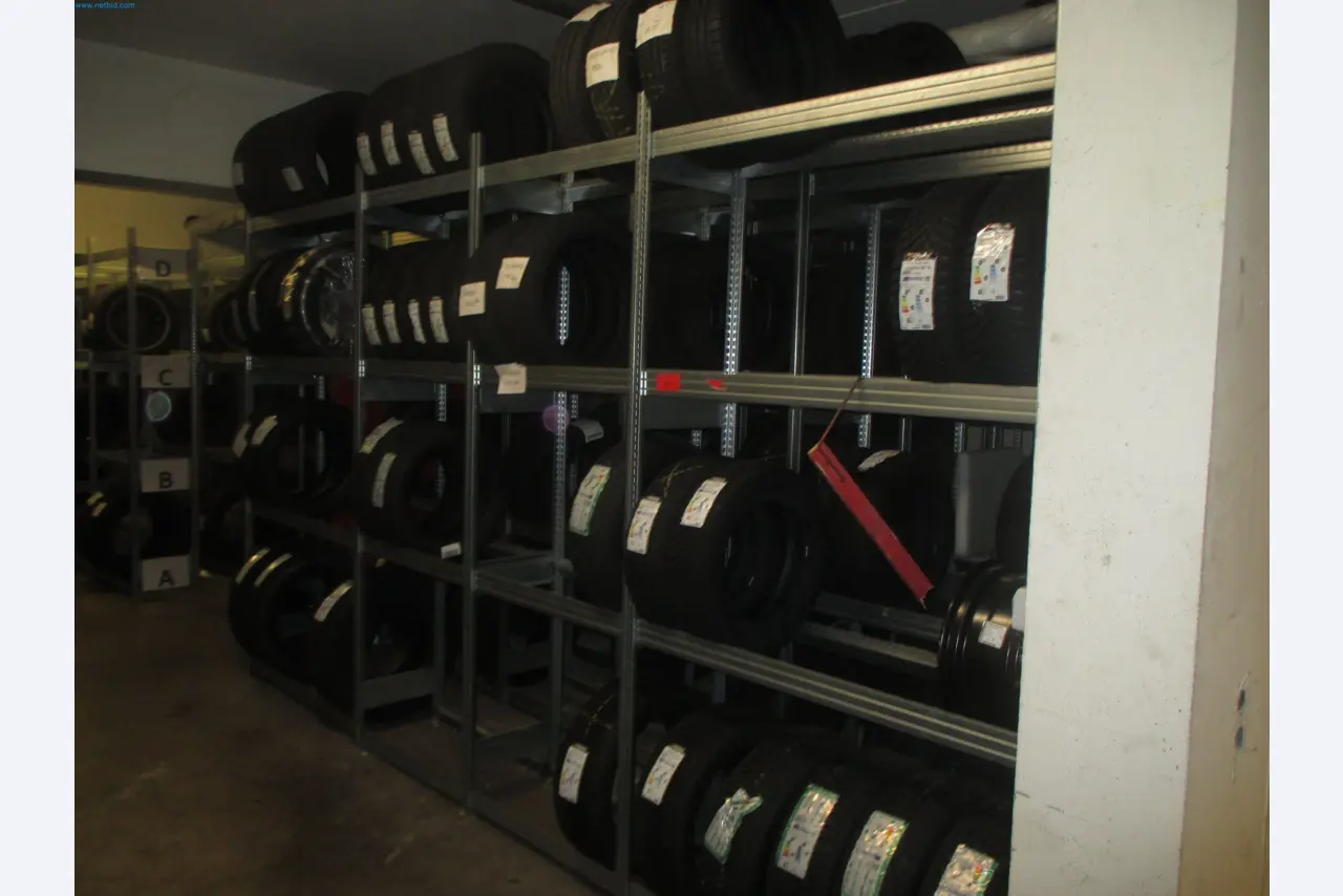 Passenger cars, electric cars, and automotive repair shop equipment at a Fiat dealership-1