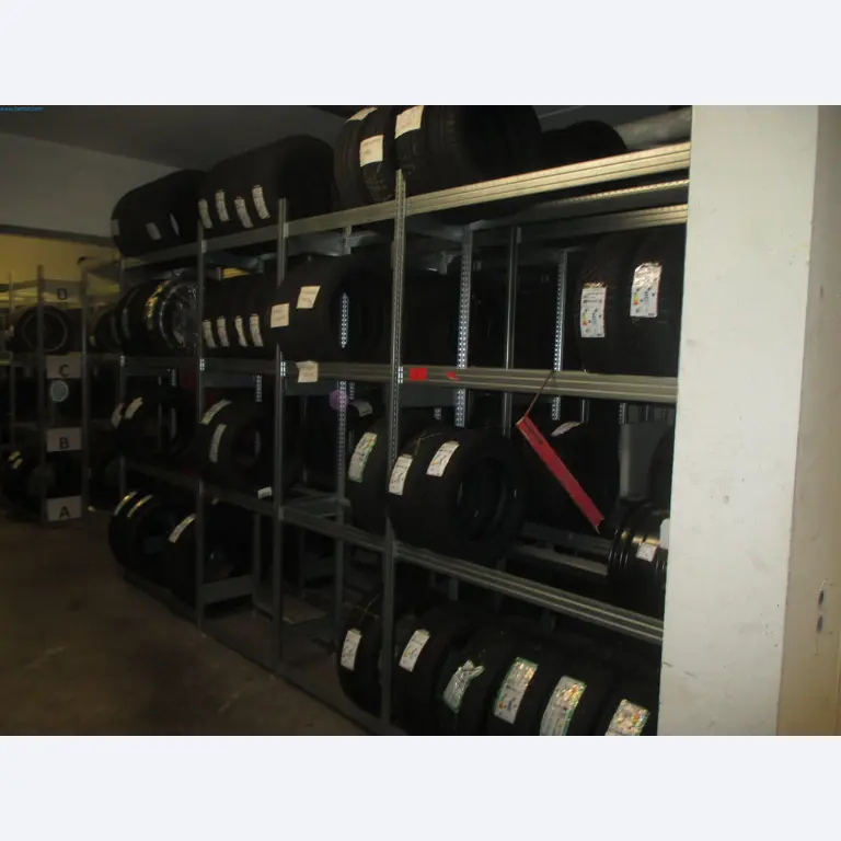 Passenger cars, electric cars, and automotive repair shop equipment at a Fiat dealership-1