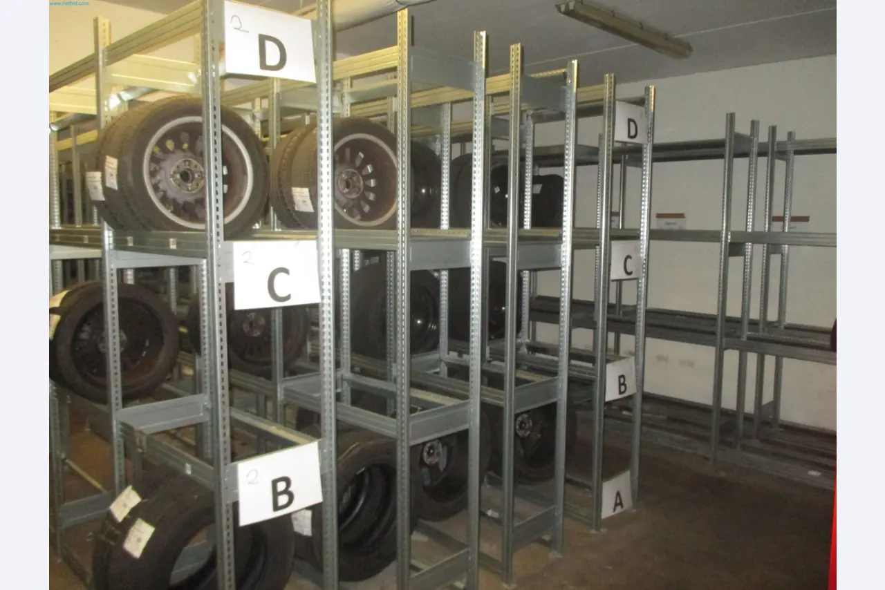 Passenger cars, electric cars, and automotive repair shop equipment at a Fiat dealership-2