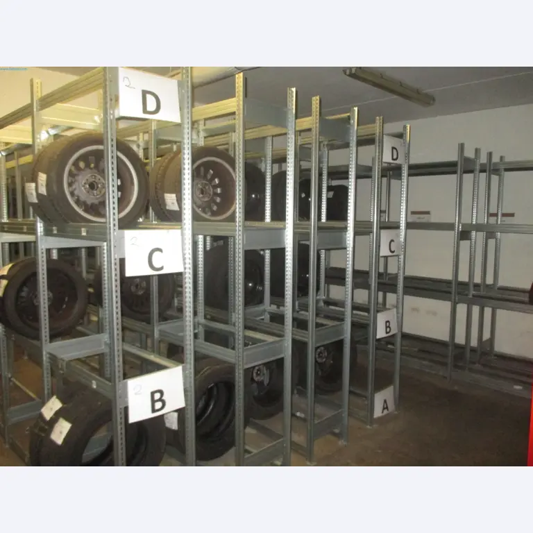 Passenger cars, electric cars, and automotive repair shop equipment at a Fiat dealership-2