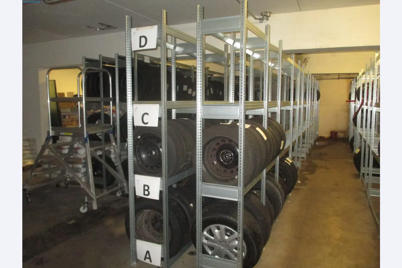 Passenger cars, electric cars, and automotive repair shop equipment at a Fiat dealership-3
