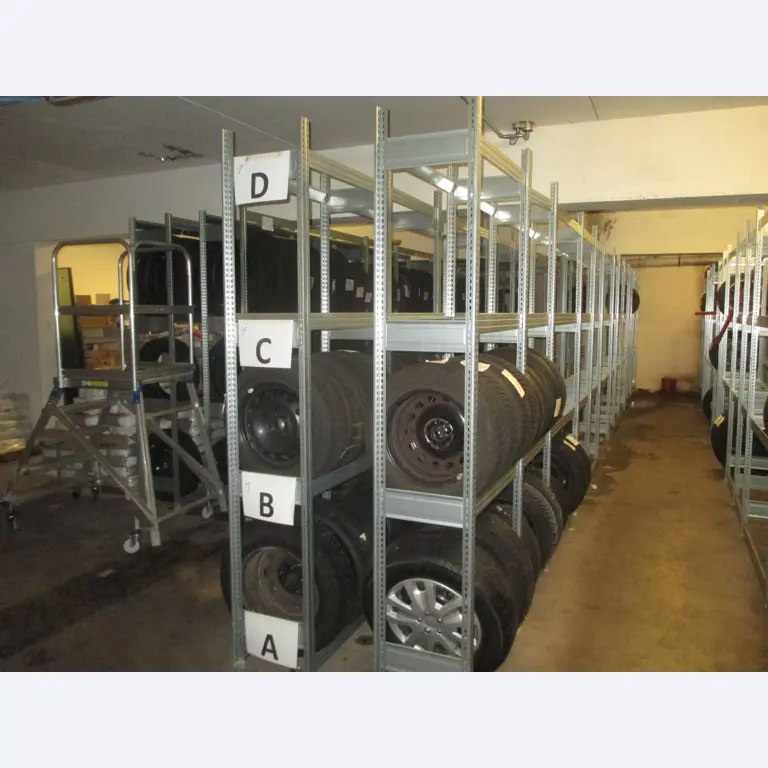 Passenger cars, electric cars, and automotive repair shop equipment at a Fiat dealership-3